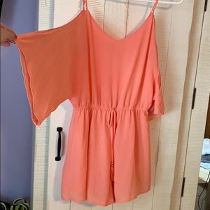 Peach romper with open shoulders